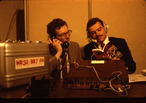 1987 WRSU Orientation Slide Show<br/>Fake Remote Broadcast in Studio A<br>Dan Schleck,Unknown<br>Slide #14
